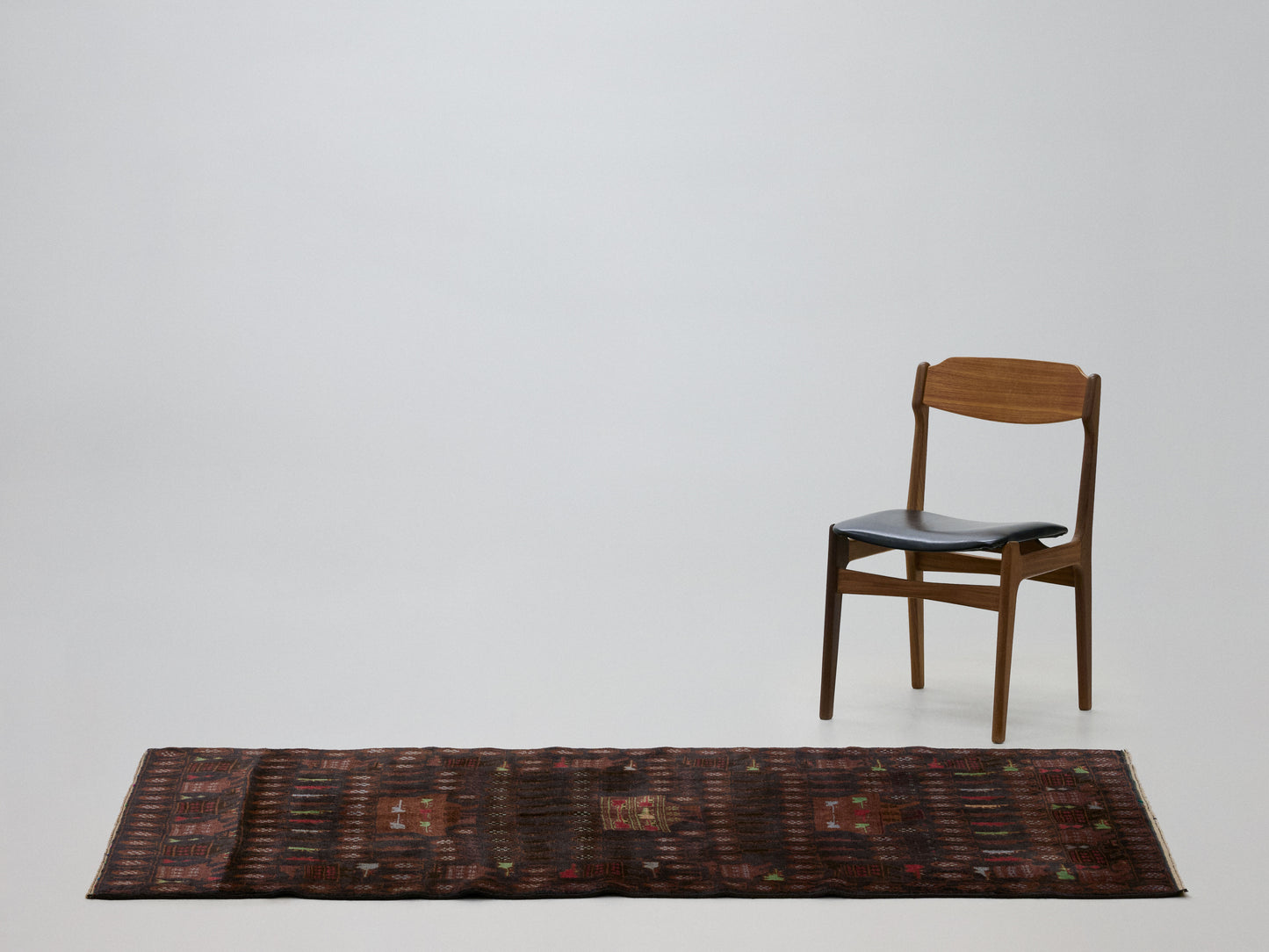 baluch rug in umber || 4'0" x 6'9"
